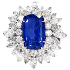 Floral 13.65 Carat Burma Sapphire Diamond Platinum Cluster Cocktail Ring | From a unique collection of vintage Cocktail Rings at https://www.1stdibs.com/jewelry/rings/cocktail-rings/. Vintage Sapphire Ring, Estate Ring, Blue Sapphire Necklace, Expensive Jewelry Luxury, Vintage Cocktail Ring, Vintage Sapphire, Platinum Diamond Rings, Diamond Cocktail Rings, Yellow Gold Setting