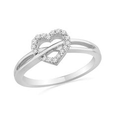 a diamond heart shaped ring on a white background