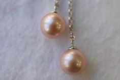 The size of the freshwater pearl is approximately 9.5x10mm, The round freshwater pearls are pinkish purple in color with high luster and is set in sterling silver. It comes with a 16 inch sterling silver pendant. Please visit our shop policies for more details. We will ship out the goods once we have received payment. For more information, Like us on Facebook, follow us on Instagram or visit our website www.ikedapearl.com If you have any questions or inquiries, please don't hesitate to contact u Elegant Pink Pearl Necklace For Anniversary, Pink Round Pearl Necklace Gift, Pink Pearl Drop Necklace For Formal Occasions, Formal Pink Pearl Necklace With Pearl Charm, Formal Pink Pearl Drop Necklace, Pink Pearl Drop Necklace For Gift, Pink Round Pearl Drop Necklace, Pink Pearl Drop Necklace, Pinkish Purple