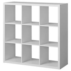 a white bookcase with six shelves on each side