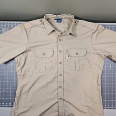 Propper Short Sleeve Uniform Shirt Size Xl. The Shirt Is New Without Tags. The Badge Holder Is Still Attached With A Plastic Hang Tag. The Shirt Is In New Condition With No Flaws Or Defects. #551 Pit-Pit=28 Back=33 One Day Shipping Excluding Sunday And Holidays. Tactical Short Sleeve Tops For Outdoor, Tactical Cotton Tops For Outdoor, Military Short Sleeve Outdoor Shirt, Military Short Sleeve Shirt For Outdoor, Outdoor Military Short Sleeve Shirt, Military Style Short Sleeve Outdoor Shirt, Uniform Shirts, Badge Holders, Casual Shirts For Men