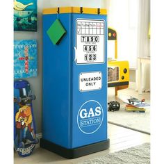 a blue gas pump sitting in the corner of a room next to a skateboard