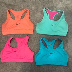 Good Condition- The Nike Symbol Is Wearing A Little But No Stains,Rips, Or Tearing. Colors Neon Orange, Pink, Blue, Teal. All Size Medium. Smoke Free Home Nike Blue Sports Bra For Training, Nike Sports Bra With Go-dry For Training, Nike Fitted Sweat-resistant Sports Bra, Nike Blue Sports Bra With Moisture-wicking, Nike Stretch Sports Bra, Sweat Resistant, Nike Symbol, Tops Nike, Neon Orange, Nike Dri Fit