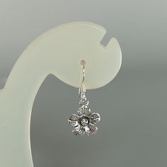 A PAIR of sterling silver flower ear danglers. Dimensions: 10 x 10 mm Drop length:22 mm Weight: 1.42 gm Price listed is for a PAIR of hoops. These earrings are made of 925 hypoallergenic sterling silver and comes with a 925 stamp. Can be packaged in a gift box. I can include a personal message from you if needed You are welcome to contact me at... bhavnakwintra1956@gmail.com For more beautiful pieces from my shop, please browse 👇 TOE RINGS: https://www.etsy.com/your/shops/TheSilverGame/tools/li Silver Flower Jewelry With Matching Earrings, Silver Pierced Flower Earrings For Gift, Delicate Silver Flower Earrings Nickel-free, Delicate Silver Flower Earrings Nickel Free, Silver Flower Earrings For Pierced Ears, Delicate Silver Nickel-free Flower Earrings, Silver Delicate Nickel-free Flower Earrings, Delicate Silver Earrings With Flower Charm, Silver Nickel-free Flower Earrings For Anniversary