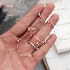 This hoop earrings are made of solid 14k Rose gold. It has natural Double Cut diamonds. Handmade big hoop earrings new design top quality trendy earrings Long Hoop Jewelry Pave Diamond Jewelry EAMJ-1172 Gross wt: 5.69gm 14k Gold wt: 5.64gm Diamond wt: 0.24ct Size: 35X45 MM You can contact me if you have any query about anything.  Have a FINE ADORNMENT!!   ✦ This is the perfect gift for mom, wife, fiancée, girlfriend, valentine, daughter, family or friend. It is a special gift for mother's day, valentine's day, wedding, anniversary, birthday, Christmas, Easter, New Year's and any holiday. ✦ Custom Orders : Since most products are handmade and made by members of my shop , you can ask us any kind of customization. You can choose from 14k Gold, 925 Silver And Diamond. For most of the items. Ge Gold Earrings With Prong Setting In 14k Rose Gold, Rose Gold Halo Earrings For Wedding, 14k Rose Gold Wedding Earrings, Delicate Rose Gold Diamond Earrings For Anniversary, 14k Rose Gold Fine Jewelry Hoop Earrings, 14k Rose Gold Hoop Earrings Fine Jewelry, 14k Rose Gold Hoop Earrings, 14k Rose Gold Hoop Jewelry, 14k Rose Gold Earrings For Wedding