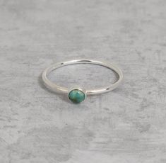 American Mined Gorgeous Turquoise Ring. Genuine Turquoise Cabochon. All of our Rings are Made to Order and custom sizes are available ex: ¼ size (leave a note at checkout). To See more Rings: https://etsy.me/2KTlJa8 And Earrings: https://etsy.me/2rii3Wr Turquoise Cabochons measures 4mm and is set in Sterling Silver .925. Ring Bands measures 1.2mm and is Sterling Silver .925 We use only recycled metals and packaging whenever possible. ♥ ♥ All pieces come packaged in a gift box ♥ ♥ Multiple items