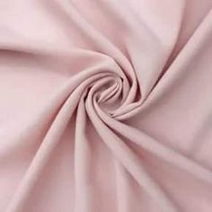 a close up shot of the fabric in light pink color, it is very soft