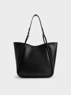 Black Tubular Slouchy Tote Bag | CHARLES & KEITH Large Designer Bags, Black Work Bag, Charles And Keith Bags, Slouchy Tote Bag, Charles And Keith, Photographie Indie, Uni Bag, Circle Handle, Slouchy Tote