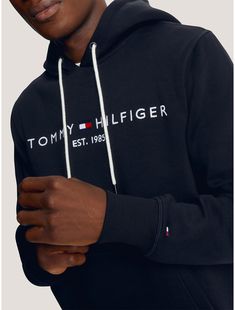 Tommy Hilfiger men's hoodie. Made from soft, brushed-back fleece with a flat, clean face and smooth handfeel, our regular-fit Tommy logo hoodie is just as comfortable as it is cool.  Material: 70% Better Cotton Initiative (bci) Cotton, 30% Polyester - Conventional. Clean Face, Tommy Hilfiger Man, Aeropostale, Emporio Armani, Athleisure, Hoodies Men, Tommy Hilfiger, Polo Ralph Lauren, Athletic Jacket