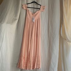 In Very Good Condition. Please See Photo Of Light Discoloration On Right Side Hip Of Dress. Rose Pink Polyester Half Lined Button Front Flared Off The Shoulder Ruched Bust Midi Dress. Measures 14” Wide Armpit To Armpit With Elastic 13” Wide Waist 28” Wide Hip And 49” Long Length Feminine Maxi Dress With Buttons, Pink Maxi Length Dress With Buttons, Rayon Maxi Dress With Ruffles For Day Out, Rayon Ruffle Maxi Dress For Day Out, Pink Maxi Dress With Buttons, Day Out Rayon Maxi Dress With Ruffles, Feminine Buttoned Maxi Length Dresses, Feminine Daywear Maxi Dress, Feminine Rayon Dress For Daywear