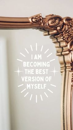 an ornate gold mirror with the words i am becoming the best version of myself