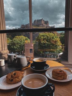 Teacups and scones on a table by a window, the view is overlooking Edinburgh Castle up on the hill on a sunny day. Voyage Europe, I Want To Travel, A Cup Of Coffee, Uk Travel, Pretty Places