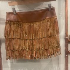 Brown Fringe Sparkle Skirt. Runs True To Size ! Brown High Waist Mini Skirt For Party, High Waist Brown Mini Skirt For Party, Chic Festival Skirt Bottoms, Chic Mini Skirt For Festival, Chic Festival Mini Skirt, Chic Festival Skirt, Elegant Mini Skirt For Festival, Brown High Waist Party Skirt, High Waist Brown Skirt For Party