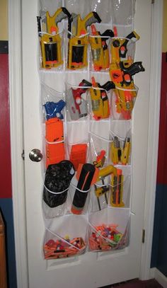 an organized door hanger filled with construction tools