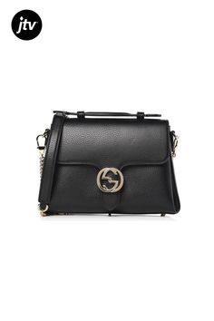 A classic Gucci handbag that will be loved for years to come. The Gucci Interlocking logo chain��crossbody bag is a must-have for any Gucci lover.�� This multifunctional bag can be carried by hand or utilize the chain and leather strap to wear over the shoulder or crossbody.�� The soft calfskin leather and classic lines make this a perfect bag for any occasion. Featuring champagne gold hardware, protective feet and front flap with clasp closure. The interior has 3 compartments and 3 interior poc Champagne Gold Hardware, Gucci Handbag, Chain Crossbody Bag, Gucci Handbags, Champagne Gold, Perfect Bag, Leather Chain, Leather Handle, Gold Hardware