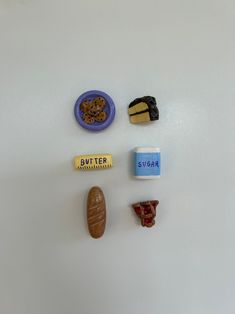 there are several different types of candy on the wall together, including cookies and butter