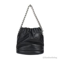 Style: Marc Jacobs Soft Small Black Shoulder Crossbody Bucket BagMaterial: Smooth LeatherFeatures: Adjustable/Detachable Crossbody Strap, Fabric Lined, Inner Snap PocketMeasures: 7.5" L x 6.75" H x 5" D Size: S.  Gender: female.  Age Group: adult. Black Pillow, Black Pillows, Marc Jacobs Bag, Black Quilt, Crossbody Strap, Cloth Bags, Smooth Leather, Bucket Bag, Marc Jacobs