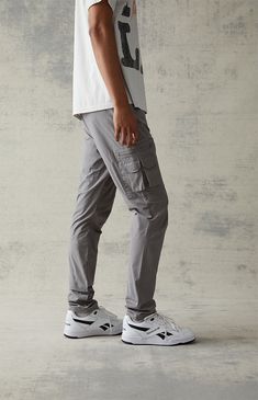 Casual meets cool with the new Eco Stretch Gray Slim Cargo Pants from PacSun. This go-to pair is designed with an elastic stretch waistline, adjustable drawstrings, side pockets, zip cargo pockets, a drawcord hem, and a slim fit.

Learn more about PacSun eco items Stretch Cargo Pants With Cargo Pockets For Outdoor, Stretch Utility Cargo Pants For Outdoor, Casual Gray Tapered Leg Cargo Pants, Outdoor Stretch Cargo Pants With Side Pockets, Casual Gray Cargo Pants With Elastic Waistband, Casual Gray Cargo Pants With Multiple Pockets, Gray Relaxed Fit Cargo Pants With Elastic Waistband, Gray Cargo Bottoms For Outdoor Activities, Relaxed Fit Cargo Pants For Athleisure