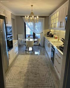 the kitchen is clean and ready to be used for dinner or other entertaining purposes in someone's home