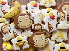 cookies decorated to look like animals and letters