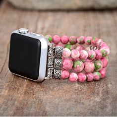 Celebrate Mother's Day with the Eternal Love Stretch Apple Watch Band! This captivating band features delicate gemstones that symbolize enduring love and appreciation. The stretchable design ensures a comfortable, personalized fit for all-day wear. Gift your mom this elegant and meaningful accessory as a token of your eternal gratitude and love. Let her carry your affection on her wrist, adding a touch of grace to her every day. Make this Mother's Day unforgettable with a gift that speaks from the heart! At Cape Diablo, all our jewelry is made by hand and is one of a kind. Each stone has been carefully selected and we only offer gems of the best quality. After ordering the Eternal Love Stretch Apple Watch Band, you will have possession of a truly unique handmade piece!  Materials: Mica Qua Personalized Pink Apple Watch Band For Gift, Personalized Pink Apple Watch Band As Gift, Elegant Watch Band With Extender Gift, Adjustable Apple Watch Band With Extender As Gift, Elegant Adjustable Pink Watch Bands, Personalized Adjustable Apple Watch Band For Gift, Elegant Adjustable Apple Watch Band For Gift, Elegant Adjustable Apple Watch Band Gift, Personalized Adjustable Apple Watch Band Gift