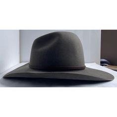 This authentic, high-end, handmade 50/50% Beaver/European Hare felt cowboy hat  has a leather band. The 3.75” brim has a slight curl. It is a size 7, and the inner band measures 22”. Western Brown Fur Felt Hat Bands, Casual Leather Wide-brim Felt Hat, Luxury Brown Fur Felt Cowboy Hat, Western-themed Flat Brim Fur Felt Fedora, Grey Felt Cowboy Hat, Felt Cowboy Hat, Chanel Hat, Felt Cowboy Hats, Slate Gray