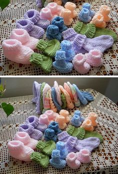 there are many knitted baby booties on the table