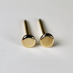 14k gold minimalist stud earrings. Round shape, circle delicate studs. These sweet little circle earrings are post/stud style and included silicon backings. You can choose 14k earrings backing from drop down menu. Circles are approximately 1/8" inch (3mm) diameter. You can purchase single or pair and with push back post and backings or screw post and backings. Please choose from drop down menu. * All our raw materials are sourced from US-based companies for the quality and safety of our handmade Minimalist Yellow Gold Round Cartilage Earrings, Minimalist Tarnish-resistant Round Cartilage Earrings, Minimalist Rounded Earrings For Gift, Minimalist Rounded Earrings For Gifts, Minimalist Rose Gold Circle Earrings, Minimalist Round 14k Gold Cartilage Earrings, Minimalist 14k Gold Round Earrings, Minimalist Rose Gold Round Earrings, Tiny Rose Gold Round Earrings