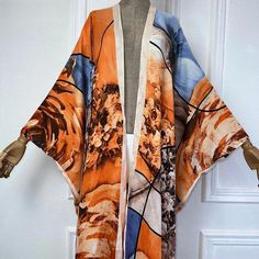 One Size fits S-3X/4X Material: Poly Silk (a lightweight, smooth, and shiny fabric that drapes and flows very well. An affordable alternative to silk) One Size Fits Most Size Chart Elegant Flowy Multicolor Kimono, Elegant Multicolor Flowy Kimono, Fall Silk Kimono With Open Front, Fall Silk Open Front Kimono, Elegant Oversized Summer Kimono, Chic Multicolor Silk Kimono, Oversized Silk Kimono, Spring Satin Wrap Kimono, Summer Beach Kimono In Satin