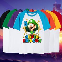 Birthday Custom T Shirt, Personalized Family shirt, All colors, All Sizes, Short, 3/4 & Long Raglan Sleeves  T-shirt super soft to the touch, fresh and with super bright images You can customize your shirts for any occasion, customize for your family, friends, etc. SIZE 3M, 6M, 12M, 18M 2T, 3T, 4T,  5T,  6T YOUTH XS,  YOUTH S.  YOUTH M.  YOUTH L, YOUTH XL S,  M, L, XL, 2XL PLEASE REFER TO SIZING CHART FOR BEST RESULTS PROCESSING TIME: 1 BUSINESS DAYS (DOES NOT INCLUDE WEEKENDS) STANDARD SHIPPING OPTION: 3-5 BUSINESS DAYS PRIORITY SHIPPING: 1-3 BUSINESS DAYS EXPRESS SHIPPING 1-2 BUSINESS DAYS Upgrading Mail DOES NOT speed up the current handling time. If you have a request for a custom order or need something by a certain day, please message me. My shipping times are an estimate; this is a Multicolor Short Sleeve T-shirt For Father's Day, Unisex Name, Family Birthday, Kids Graphic Tees, Family Shirt, Family Birthdays, Son Love, Personalized Family, Family Shirts