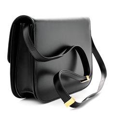 This is an authentic CELINE Box Calfskin Medium Classic Box Flap Bag in Black. This bag is crafted of calfskin leather in black. This shoulder bag features a facing gold press lock that opens the flap to a partitioned matte black leather interior with a zipper compartment and patched pockets. Celine Box, Flap Bag, Leather Interior, Calf Skin, Matte Black, Black Leather, Shoulder Bag, Zipper, Leather