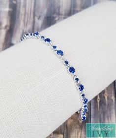 ❤Shop with us online at - https://SomethingIvy.com/❤ Something Blue Bracelet - Sapphire Blue Bracelet - Silver/Blue Bracelets - Wedding Bracelet - Royal Blue Crystal Bracelet Matching necklace - https://www.etsy.com/listing/785385383/fast-ship-sapphire-blue-necklace-royal Matching Earrings available for all bracelet colors, see the earrings section Sign up for promotions here - https://somethingivy.com/pages/promo-sign-up Lovely bracelet, available in Bulk for Bridesmaids Orders or Pageants, ple Royal Blue And Silver Jewelry, Elegant Adjustable Blue Crystal Bracelet, Elegant Adjustable Blue Bracelets, Adjustable Blue Bracelet For Formal Occasions, Adjustable Blue Crystal Bracelet For Wedding, Adjustable Blue Party Bracelets, Adjustable Sapphire Bracelets For Wedding, Adjustable Sapphire Bracelets For Formal Events, Adjustable Sapphire Bracelets For Formal Occasions