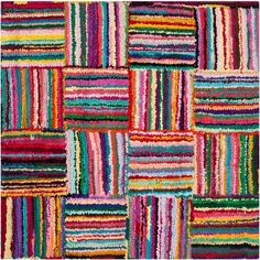 multicolored striped rugs are arranged in rows, with different colors and sizes