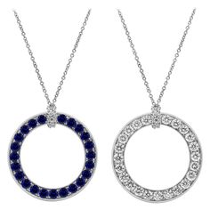 A unique pendant necklace, showcasing round brilliant cut diamonds weighing 1.60 carats total on one side, and round cut blue sapphires weighing 1.80 carats total on the other side. Finely made with 18K white gold. Attached to an 18 inches adjustable white gold chain.  Roman Malakov is a custom house, specializing in creating anything you can imagine. If you would like to receive a special quote on a custom piece, please message or call us. Sapphire Diamond Pendant, Diamond Circle Pendant, Blue Sapphire Pendant, Sapphire Necklace Pendants, Blue Sapphire Necklace, Peacock Pendant, Unique Pendant Necklace, White Gold Chain, Round Sapphire