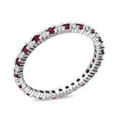 Celebrate your anniversary or any special occasion with this spectacular gemstone and diamond eternity band. Crafted in exquisite platinum, this sleek and streamlined design sparkles with alternating bright red rubies and dazzling diamonds. Radiant with 1/4 ct. t.w. of diamonds and a brilliant buffed luster, this slender anniversary band conveys your everlasting love. Elegant Red Ruby Eternity Band, Red Ruby Ring With Channel Set Diamonds, Elegant Red Round Eternity Band, Elegant Red Round Cut Eternity Band, Red Eternity Band With Prong Setting, Red Round Eternity Band With Prong Setting, Red Round Eternity Band For Formal Occasions, Red Ruby Round Eternity Band, Ruby Eternity Band