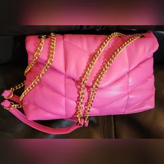 Fuschia Quilted Bag With Chain Straps. Pink Bag With Chain Strap, Pink Chain Strap Bag, Pink Shoulder Bag With Chain Strap For Everyday, Chic Pink Shoulder Bag With Chain Detail, Chic Pink Shoulder Bag With Chain, Pink Pouch Shoulder Bag With Chain Strap, Pink Crossbody Evening Bag With Chain Strap, Pink Evening Bag With Chain, Pink Pouch Bag With Chain Strap