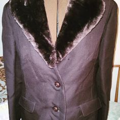 This coat is stunning.It looks like it's not been worn.British designer Alexander Milne Pure Virgin Wool with Faux fur brown collar.Not removable.It is in great condition.It is a size 6-8 US and small -medium.Luxury Designer Coat for women.See photos for label.It is clean and ready to wear.Looks purple but it's a warm two tone brown.Coat measures: chest 19 inches back shoulders 14 inches sleeve is 23 inches waist is 19 inches  full length is 41 inches that includes the collar.2 pockets are deep Knee Length Coat, Brown Coat, Coat Design, Faux Fur Collar, Fur Collar, Fur Collars, Wool Coat, Luxury Designer, Women's Blazer