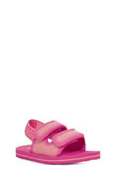 Pillowy cushioning and lightweight construction make this kid-size slingback sandal the perfect pick for the sunnier seasons. Adjustable slingback strap with hook-and-loop closure Cushioned footbed Textile upper/recycled-textile lining/synthetic sole Imported Ugg Sandals, Ugg Kids, Boys Sandals, Kids Uggs, Girls Shoes Kids, Slingback Sandals, Slingback Sandal, Casual Sandals, Dillard's