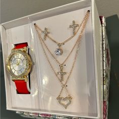 New In Box Ashley Princess Collection Watch & Jewelry Box Set. Retail $45. Set Includes Quarts Watch In Gold/Silver Tone With Rhinestone Crystals And Red Band, Earrings And Necklace In A Beautiful Floral Gift Box. Simply Lovely Set That Any Woman Would Love! Elegant Silver Watch For Valentine's Day, Valentine's Day Elegant Silver Watch, Silver Quartz Watches For Valentine's Day, Valentine's Day Jewelry In Gift Box, Silver Watch For Valentine's Day Gift, Silver Watches For Valentine's Day Gift, Silver Valentine's Day Gift Watches, Band Earrings, Bullet Necklace