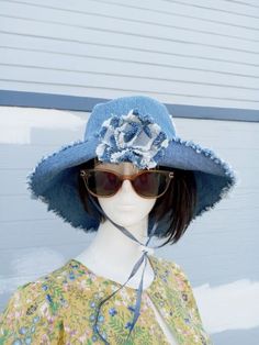 "This pretty bucket hat is a true 90s early 2000s classic. It is made of upcycled denim  and chambray fabric. It is reversible and machine washable. It has a wide brim that helps shield you from the sun's rays. This is perfect for outdoors activities like going to the beach, hiking or gardening. It has an adjustables drawstrings to protect blowing the hat off your head. It has a flower brooch at front and it is detachable. It is reversible and adjustable fit. It has a 23\" to 24\" circumference Hat Y2k, Hipster Hat, Denim Bucket Hat, Outdoors Activities, Hat Wide Brim, Chambray Fabric, Wide Brim Sun Hat, Hat Summer, Stylish Hats