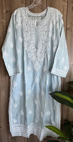 Soft cotton hand embroidered Kurta in a pretty blue gray color ! Length:47 inches Liner included Embroidery designs may vary Chikankari Pattern, Design Motifs, Blue Gray, Womens Clothing Tops, Hand Embroidered, Blue Grey, Embroidery Designs, Gray Color, Display Homes