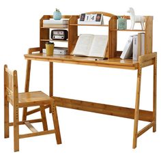 a wooden desk with a book shelf and chair next to it, in front of a white background