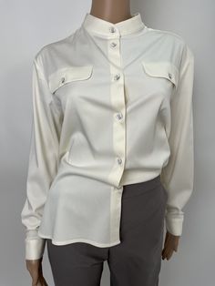 Elegant white viscose blouse, soft and pleasant to the body material. Loose silhouette with buttons down the front. Long sleeve with cuff. Button cuff fastening. The blouse is suitable for the office and for free time. Perfectly combined with a skirt, trousers and jeans. We also make the model in individual sizes. If you wish, send your measurements and you will have a blouse just for you. We make quality garments for sustainable fashion. We do not accept returns or exchanges for this product if White Shirt For Women, Skirt Trousers, Viscose Blouse, Jumpsuit Fitted, Elegant Shirt, Shirt Long Sleeve, Shirt For Women, Shirt Fashion, Outfit Details