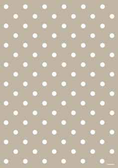 a pink background with white polka dots