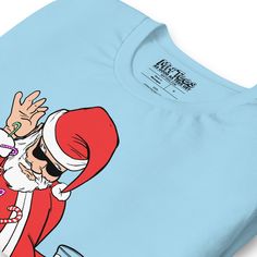 Funny Santa Claus t-shirt with Santa throwing candy canes while holding a glass of eggnog. A funny Santa Bae graphic tee for anybody feeling festive during the holidays and looking for a funny Santa t-shirt for a Christmas party. • 100% combed and ring-spun cotton (Heather colors contain polyester) • Fabric weight: 4.2 oz./yd.² (142 g/m²) • Pre-shrunk fabric • Side-seamed construction • Shoulder-to-shoulder taping • Blank product sourced from Nicaragua, Mexico, Honduras, or the US Holiday Party T-shirt With Crew Neck, Fun Holiday T-shirt With Graphic Print, Fun Holiday Graphic Print T-shirt, Fun Graphic Print T-shirt For Holiday, Christmas Party T-shirt With Graphic Print, Funny Holiday T-shirt With Graphic Print, Funny Crew Neck T-shirt For Gifts, Funny Crew Neck T-shirt For Party, Funny Graphic Print T-shirt For Holidays