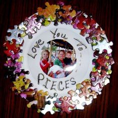 a plate that has some pictures on it with the words i love you to pieces