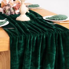 the table is covered with green velvet