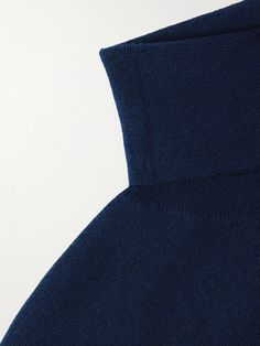 There's an air of sophistication that comes with a rollneck sweater, whether you wear it solo or under a blazer. Polo Ralph Lauren's style is made from fine-gauge merino wool and has softly ribbed trims. Note the tonal pony logo embroidered at the chest. Fitted Blue Cashmere Sweater, Blue Fitted Cashmere Sweater, Fitted Blue Wool Sweater, Blue Fitted Wool Sweater, Blue Fitted Turtleneck With Funnel Neck, Blue Merino Wool Polo Sweater For Workwear, Classic Fitted Blue Polo Sweater, Fitted Classic Blue Polo Sweater, Fitted Blue Classic Polo Sweater