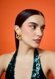 Indulge in understated luxury with our Pretzel Earrings. Crafted with delicately twisted metal, these studs are the perfect accessory for any outfit. Subtle yet eye-catching, they are a must-have for any fashion-forward individual. Elevate your style game with our Pretzel Earrings. 🌸 〰️〰️〰️ 🌸 〰️〰️〰️ 🌸 Care and CompositionMaterial: Brass Metal, 22kt gold plating, Hypoallergenic. Store in a cloth bag or an airtight box. Keep away from water and alcohol based products like Perfumes, Deodorants e Chic Formal Plug Earrings, Chic Gold-plated Drop Clip-on Earrings, Chic Gold Plated Drop Clip-on Earrings, Glamorous Gold Plated Earrings For Parties, Elegant Metal Plug Earrings, Trendy Evening Drop Clip-on Earrings, Elegant Gold Plated Plug Earrings For Party, Gold-plated Wrap Earrings For Party, Trendy Evening Hoop Earrings For Pierced Ears