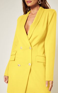 This blazer dress will give you a fierce look with tons of attitude. Featuring a classic fabric with an asymmetric design and gold button detailing, style with gold heels and a pendant necklace for a chic weekend vibe. Yellow Blazer, Sequin Rompers, Sequin Blazer, Sequin Jumpsuit, Jumpsuit Jacket, Cocktail Attire, Gold Heels, Sequin Fabric, Asymmetrical Design